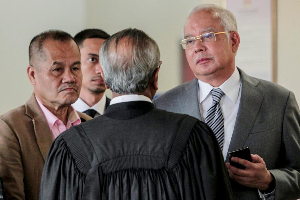 Ex-PM Datuk Seri Najib Abdul Razak takes a break during his trial of misappropriating SRC International Sdn Bhd funds at Kuala Lumpur High Court on May 29, 2019. — BBX