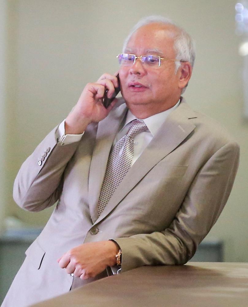 Former prime minister Datuk Seri Najib Abdul Razak during a break in his corruption trial involving RM42mil of SRC International Sdn Bhd at the High Court in Kuala Lumpur on June 19, 2019. — BBX