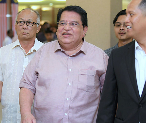 Filepix taken on July 3 shows Datuk Seri Tengku Adnan (two, left) at the Kuala Lumpur High Court. — BBXpress