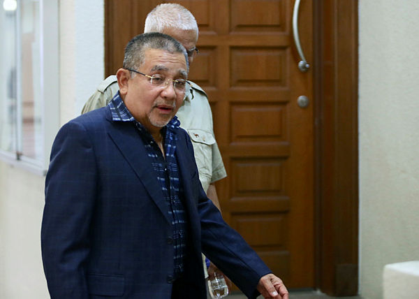 Former Felda chairman Tan Sri Mohd Isa Samad appears for the 11th day of his trial for criminal breach of trust and corruption involving more than RM3 million in the purchase of MPHS worth RM160 million, at the Kuala Lumpur Court Complex. — BBXpress