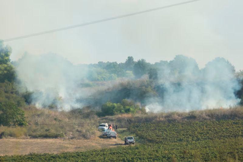 Smoke billows after a missile attack from Yemen in central Israel - REUTERSpix