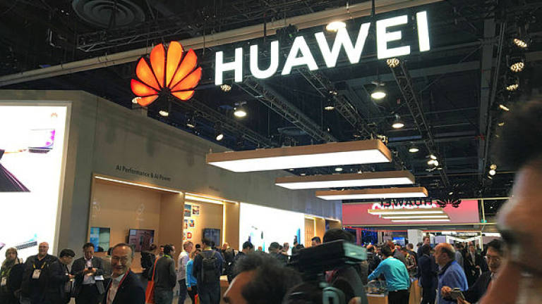 Huawei booth is seen during CES 2019 consumer electronics show at the Las Vegas Convention Center in Las Vegas, Nevada. US authorities are in “advanced” stages of a criminal probe that could result in an indictment of Chinese technology giant Huawei — AFP