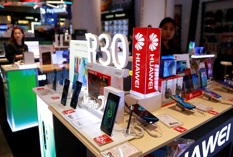 An employee sells Huawei P30 handset in a shopping centre in Bangkok, Thailand May 22, 2019. — Reuters