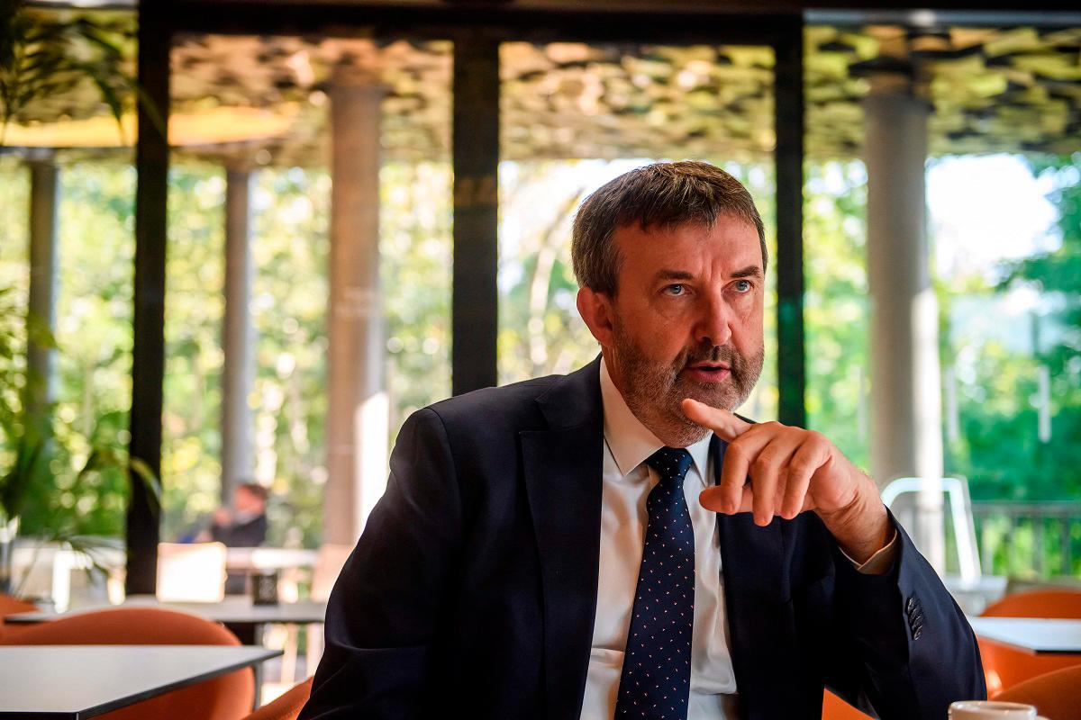 The Hungarian government’s AI Commissioner Laszlo Palkovics speaks during an AFP interview on the sidelines of a two-day AI conference at the Hungarian House of Music in Budapest, Hungary, on September 8, 2025. - FERENC ISZA / AFP