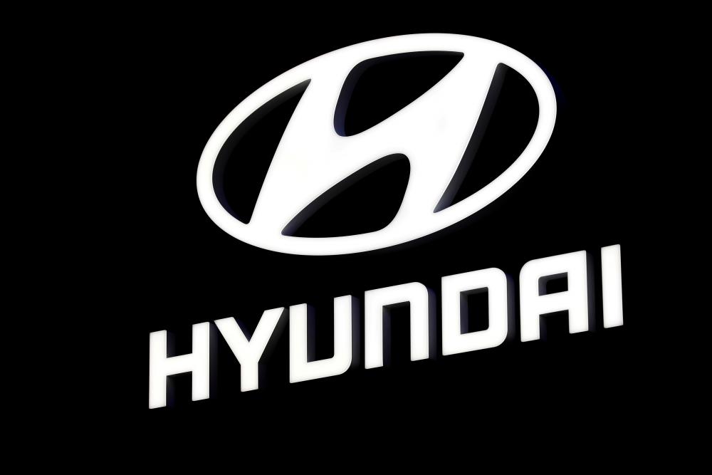 The Hyundai logo at the carmaker’s booth in a motor show. – REUTERSPIX