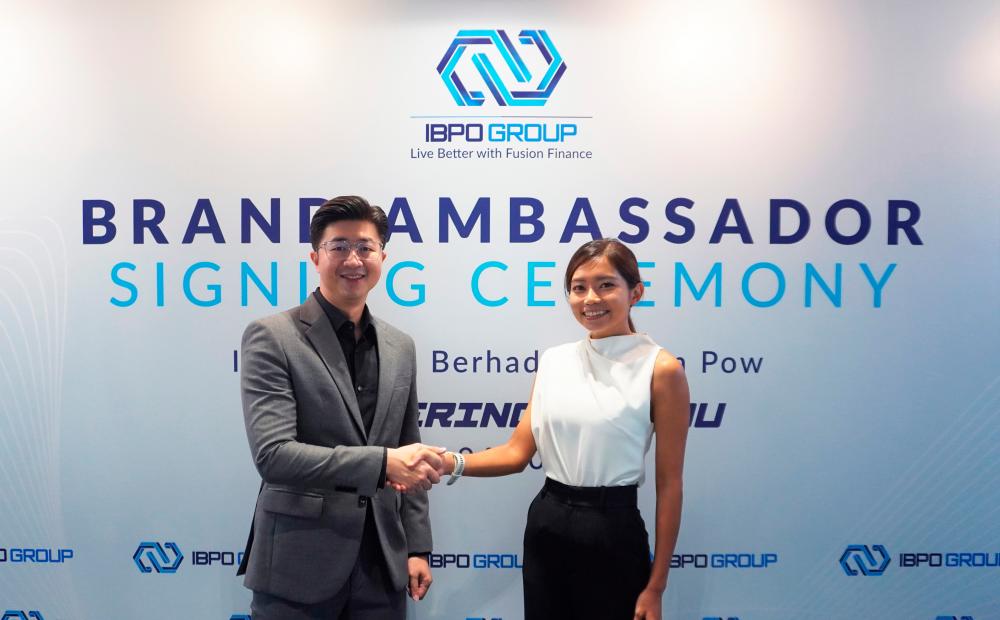 $!IBPO Group Bhd founder and group managing director Andy Lim (left) alongside IBPO brand ambassador Pow.