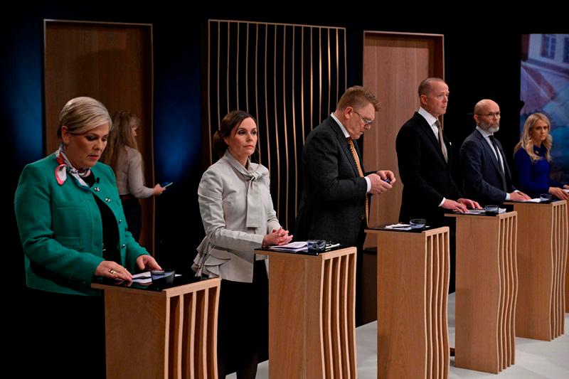 Presidential candidates, including front runners, former Icelandic Prime Minister Katrin Jakobsdottir (2nd L) and Halla Tomasdottir (L) take part in a debate in Reykjavik on May 31, 2024. Iceland will elect a new President on Saturday. - AFPPIX