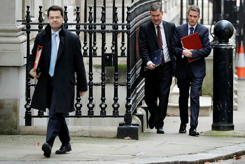 Britain’s Housing, Communities and Local Government Secretary James Brokenshire (L), Justice Secretary David Gauke (C) and Defence Secretary Gavin Williamson arrives to attend the weekly meeting of the Cabinet on Dec 18, 2018. —AFP