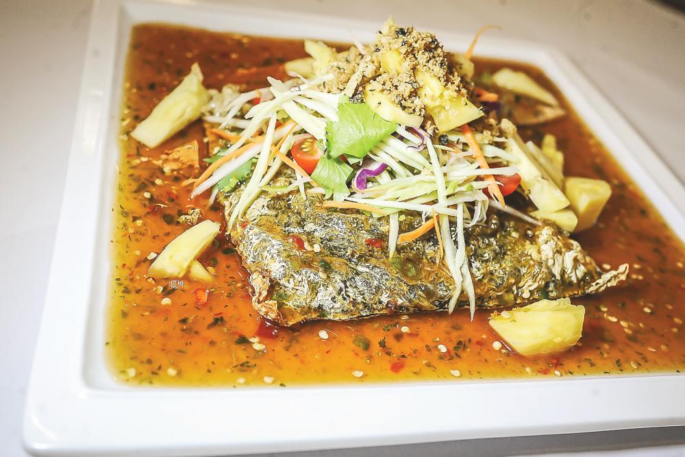 Deep Fried Whole Fish with Thai Tangy sauce. – ADIB RAWI/THESUN