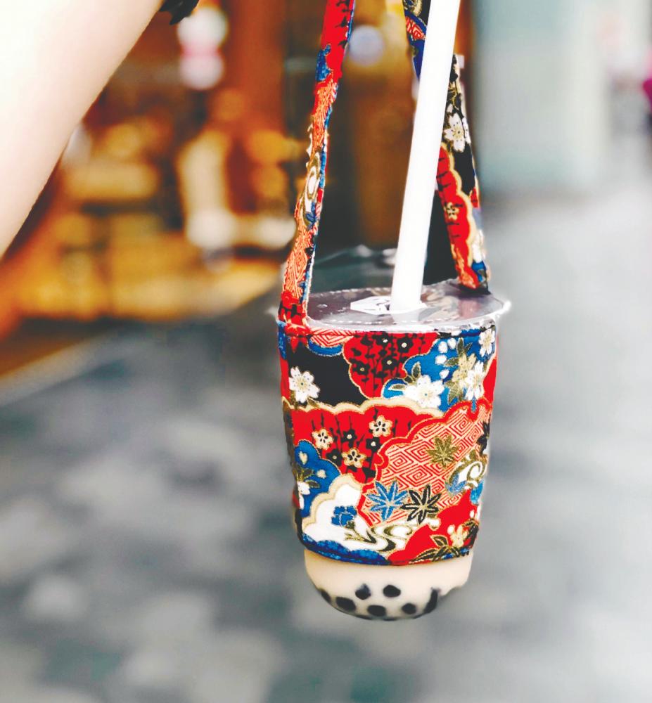 $!A bubble tea cup carrier created by Ding.– Courtesy of Ding Yan Wen