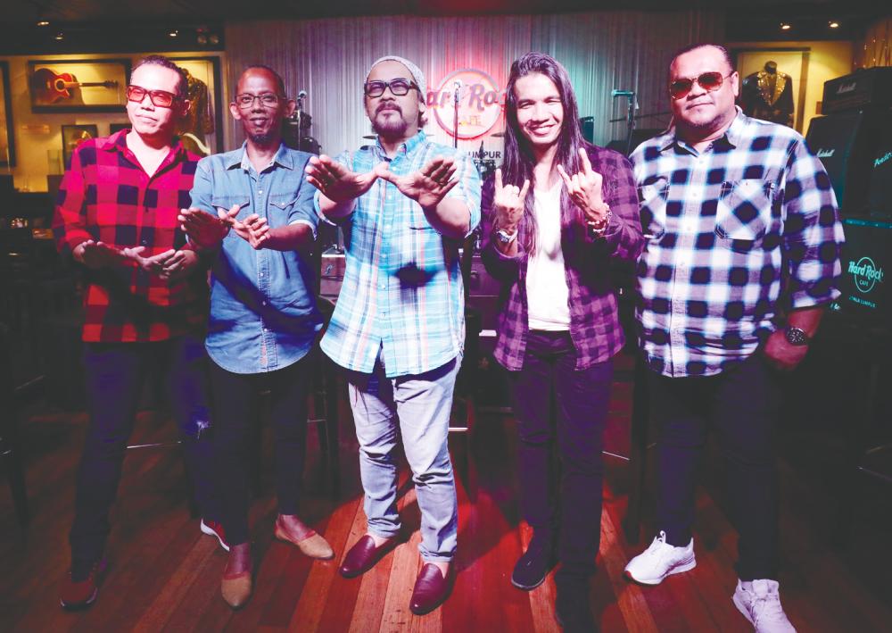 Awie (centre) and the rest of Wings are set to perform at SNL in the Hard Rock Cafe Kuala Lumpur. – MASRY CHE ANI/THESUN