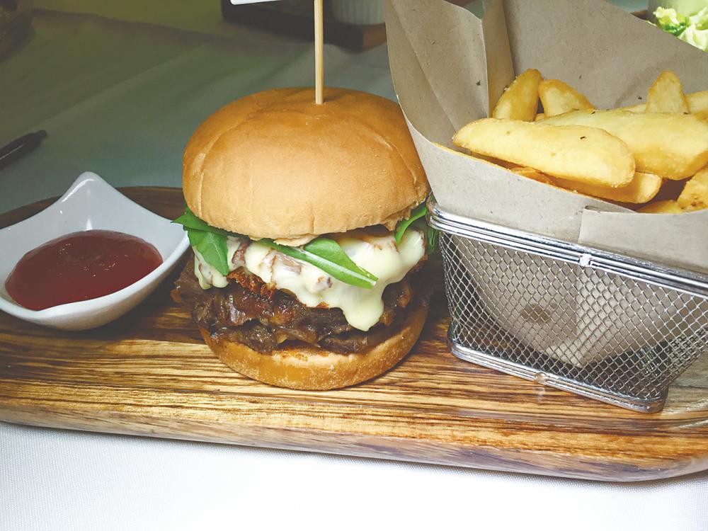 The Sticky Wicket Beef Rib Burger. –PICTURES BY TAN BEE HONG