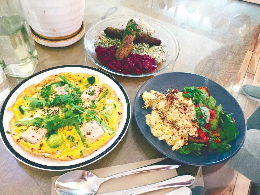 (From left) Keto Salmon Omelette, Lamb Kofte &amp; Baba Ganoush, and Avocado Toast. – PICTURE BY TAN BEE HONG
