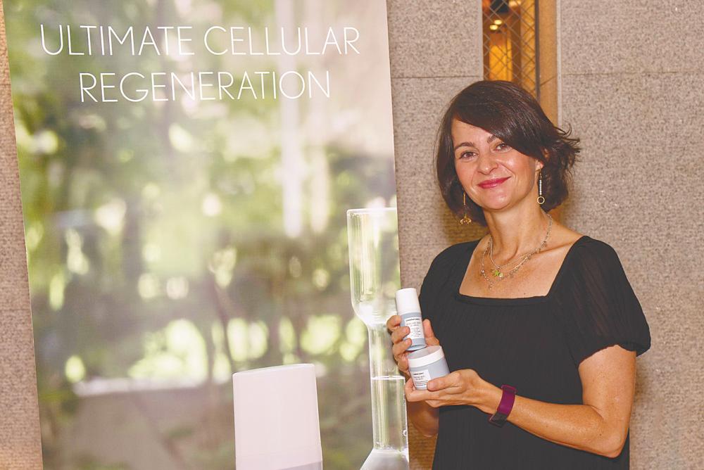 Helena Holden, international manager of [comfort zone], with the Oil Serum and Oil Cream in the Sublime Skin Hormon-Aging line.