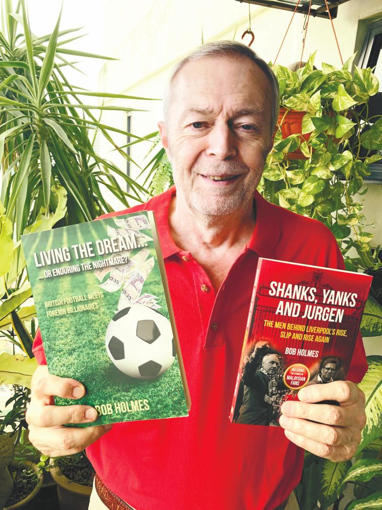 English football columnist Bob Holmes with his first book and the latest book. - SUNPIX BY LIVINGESHAN KRISHNAN