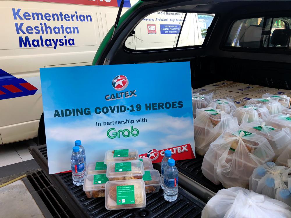 Food packs from Caltex to health, law frontliners