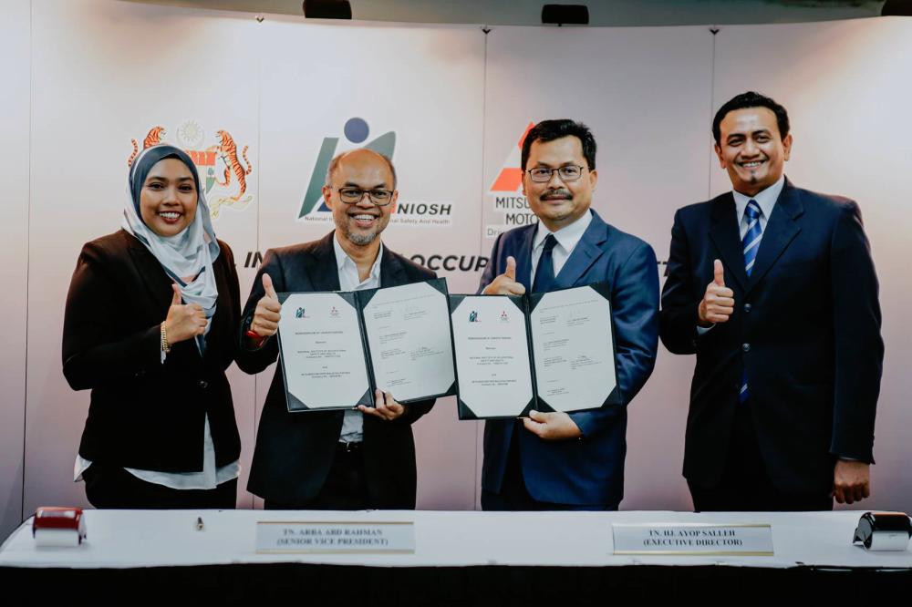 SIGNED. (From left) MMM corporate fleet section assistant manager Zainurazreen Mohd Izam and senior vice president Arba Abdul Rahman, NIOSH executive director Ayop Salleh and general manager of consultation and research Khairunnizam Mustapa during the MoU signing ceremony.