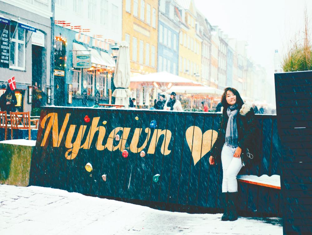 Stewardess and Instagrammer girl_in_sarong_kebaya in the district of Nyhavn in Copenhagen, Denmark. – Courtesy of girl_in_sarong_kebaya