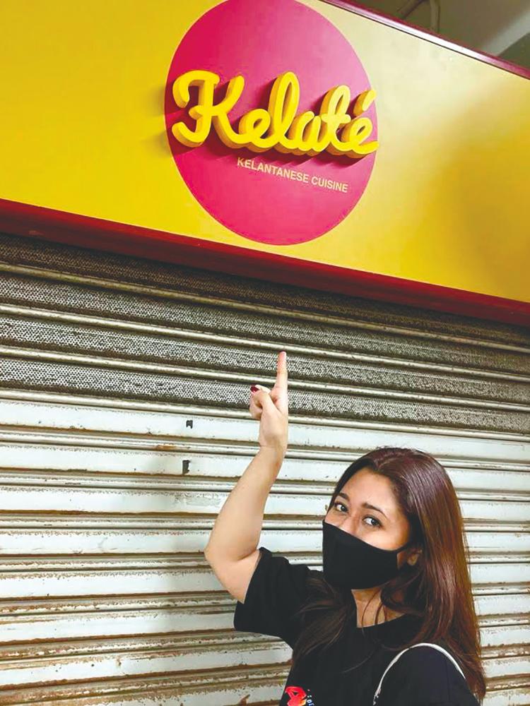 Sasqia in front of her shop in Tao Payoh, Singapore. – COURTESY OF NURLISASQIA IG PIX
