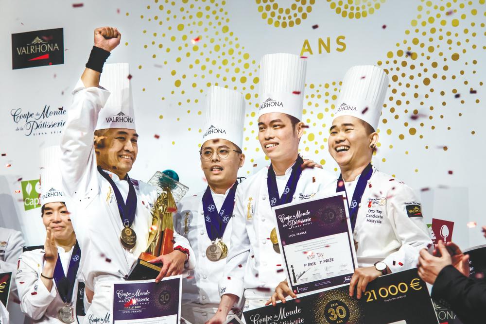 World pastry champions ... (from left) Siau, Loi, Tan and Tay in Lyon, France. – DIPH PHOTOGRAPHY/ FRENCH EMBASSY IN MALAYSIA