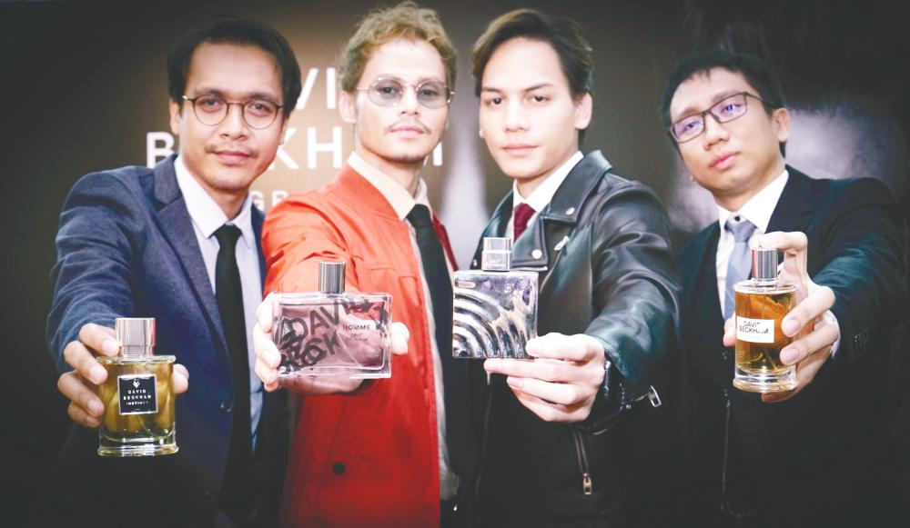 (From left) Azwan Kombos, Ryzal Jaafar, Ikmal Amry and Faeez Fadhililah showcasing the four distinct fragrances by David Beckham - Instinct, Homme, Respect and Classic.