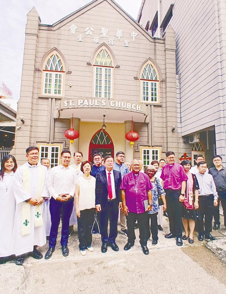 Chow (centre) with church officials and dignitaries during the groundbreaking ceremony. – T.C. KHOR/theSun