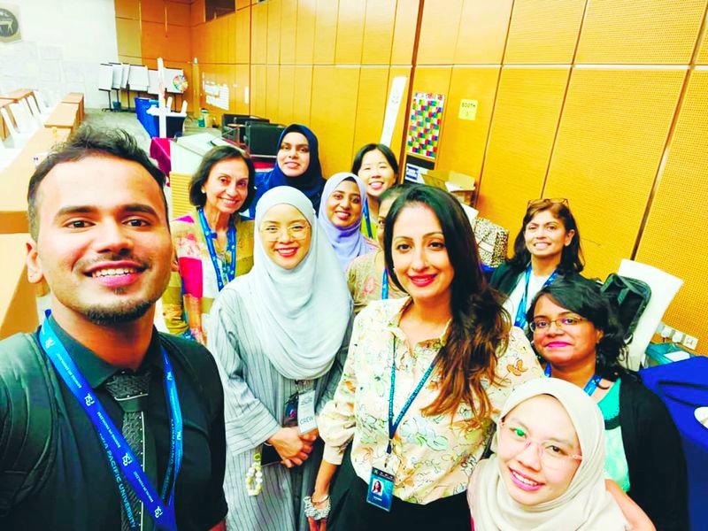 $!Sharen Kaur (centre) at Asia Pacific University’s specialist language centre supported WoW’s initiatives.