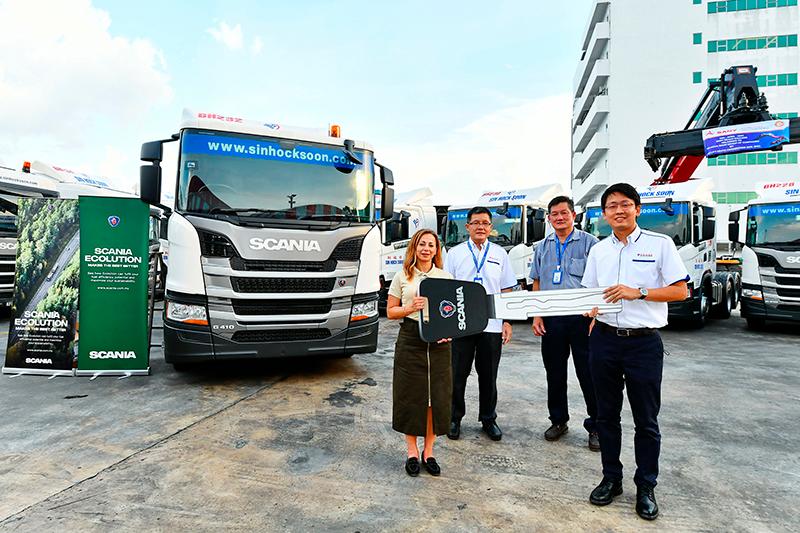 Scania Southeast Asia managing director Heba El Tarifi (left) handing the key of the first batch of NTG deliveries to Sin Hock Soon Group general manager/director Shawn Yew Ee Sheng.