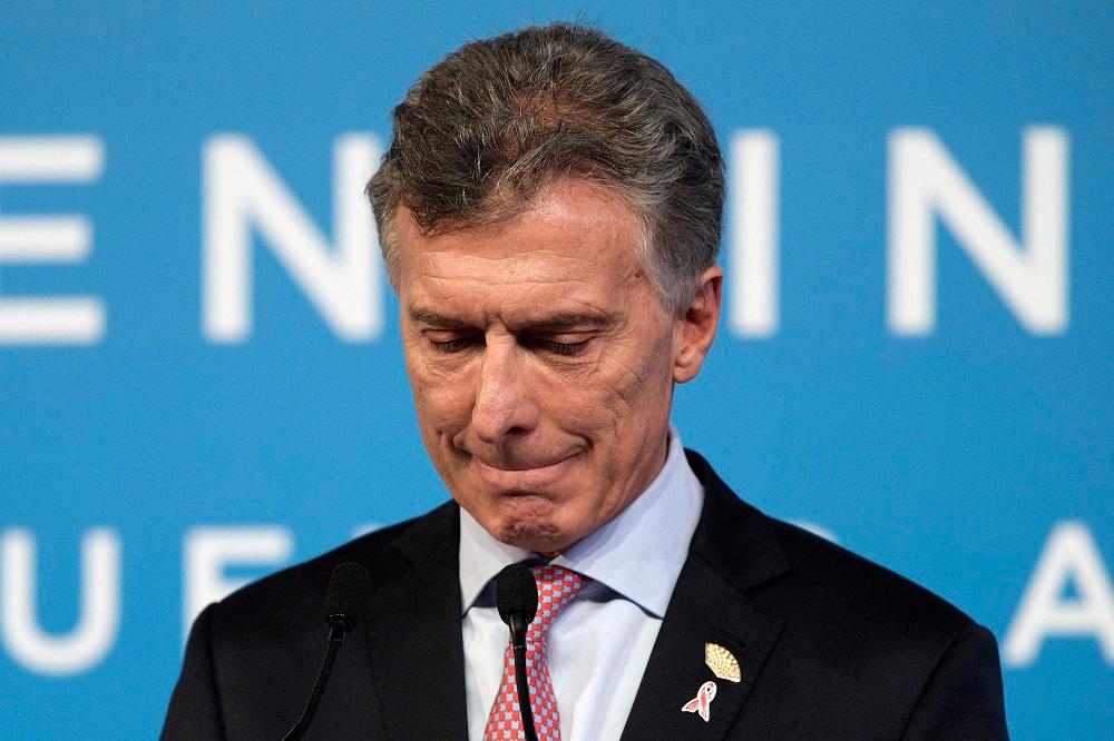 (FILES) In this file photo taken on December 01, 2018 the then Argentina's President Mauricio Macri gestures during the final press conference, on the second day of the G20 Leader's Summit, in Buenos Aires. AFPpix
