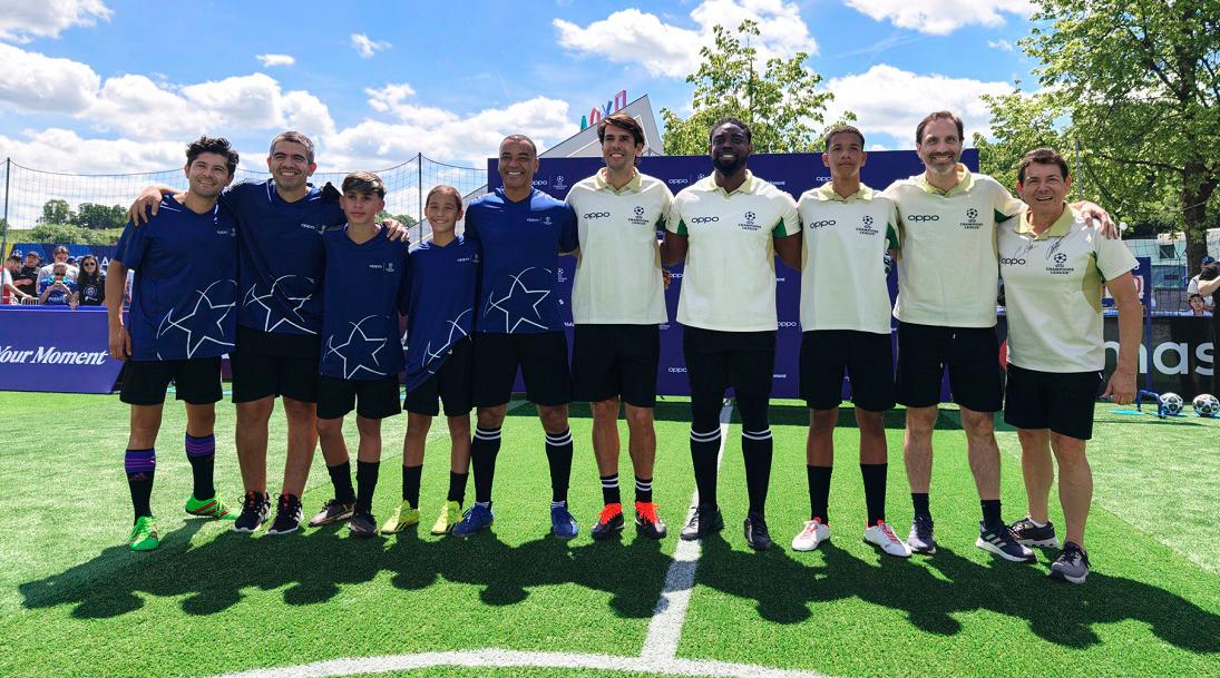 Uefa legends pose for photos after a friendly game with young players from Brazil.