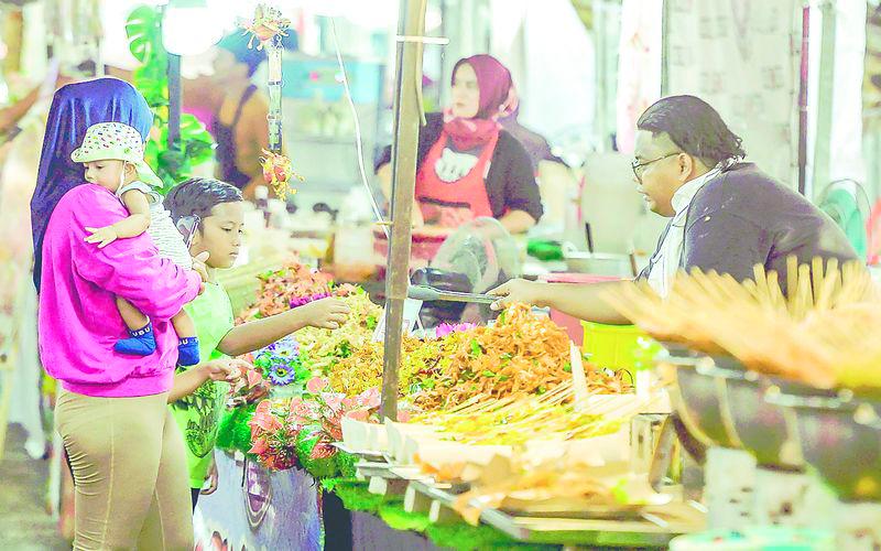 Getting children involved in food preparation and grocery shopping also makes healthy eating fun and educational. – Adib Rawi Yahya/THESUN