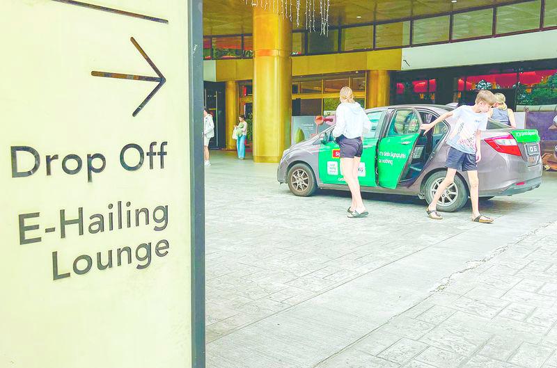 E-hailing drivers have lamented that fare hikes have not translated into better earnings due to the rise in operational costs. – AMIRUL SYAFIQ/THESUN