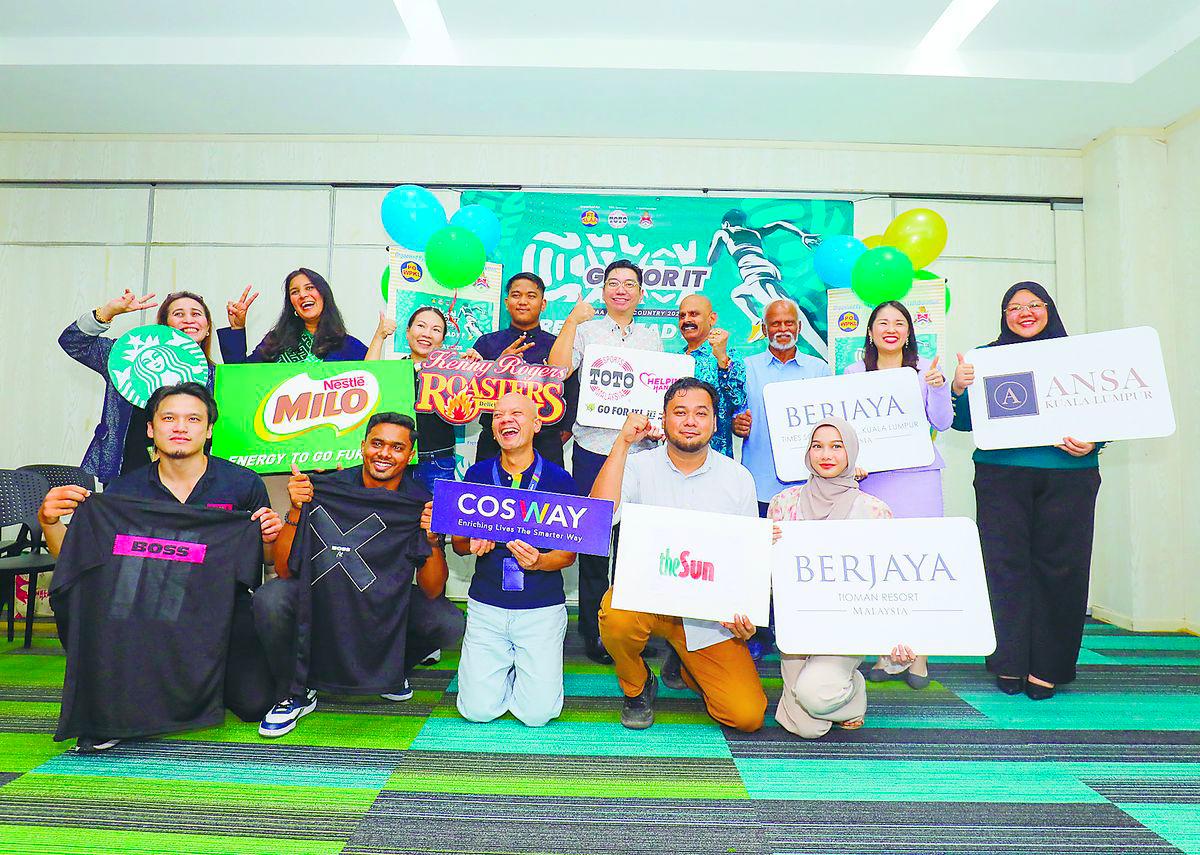 Some of the sponsors of the run at the official launch yesterday. – Adib Rawi Yahya/theSun