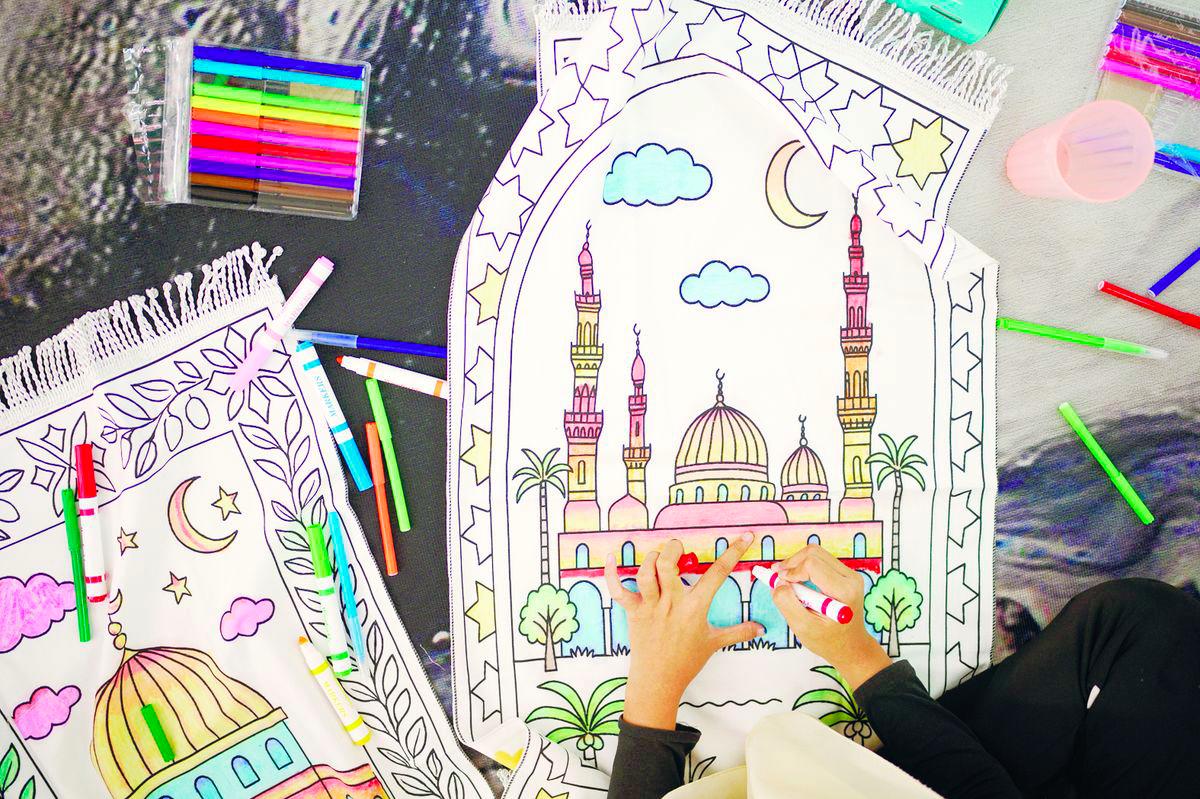 The interactive prayer mats that children can colour while learning about sacred Islamic landmarks. – Pic courtesy of The Bayan Collection