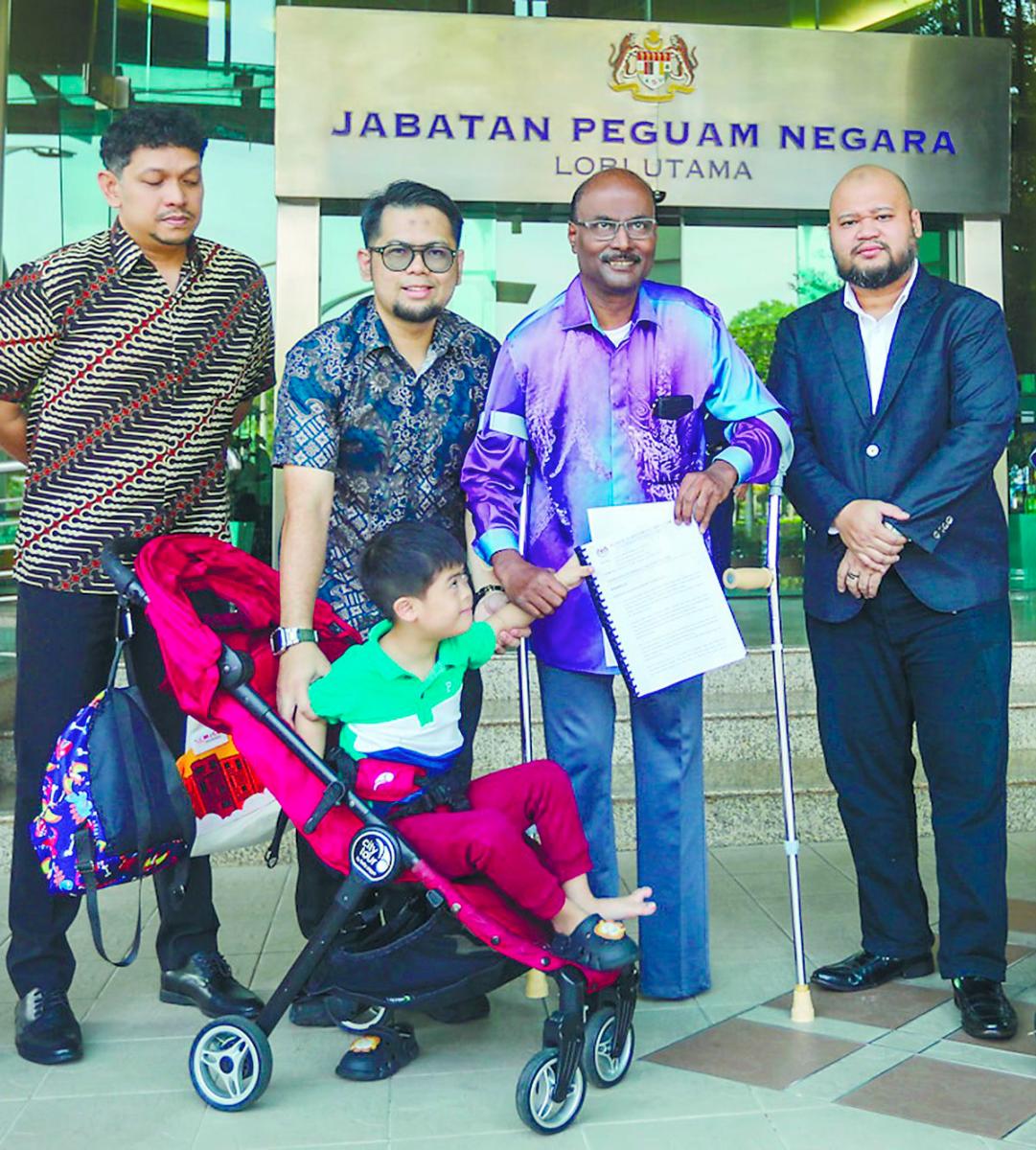 Isaiah (third from left) at the Attorney-General’s Chambers after submitting a memorandum. – Adam Amir Hamzah/theSun