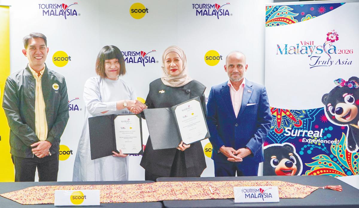 (From left) Chan, Yap, Norliza and Azfar during the signing event at the Scoot headquarters in Singapore.