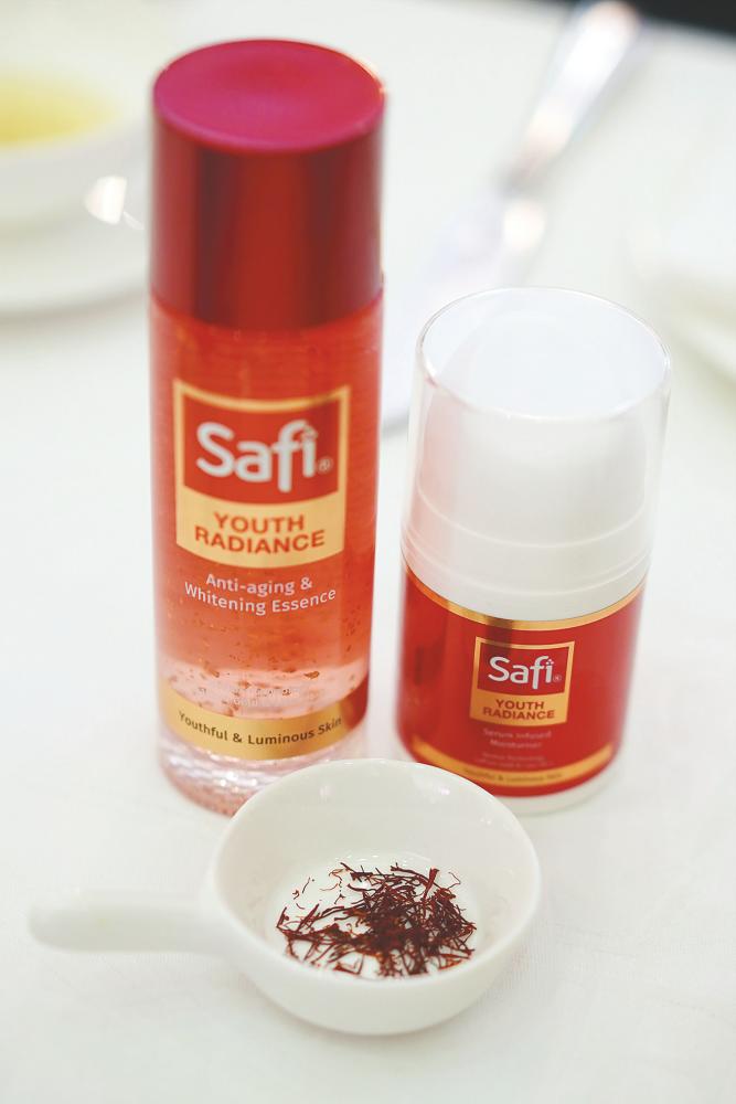 The Safi Youth Radiance Anti-ageing Whitening Essence (far left) and the Serum Infused Moisturiser (left), both are infused with saffron spice. – NORMAN HIU/THE SUN