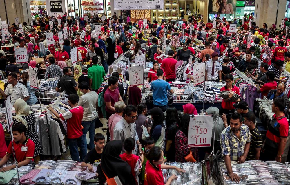 Most people shopping for their final preparations before the upcoming celebrations of Hari Raya Aidil Fitri at a shopping mall in Kuala Lumpur. - Adib Rawi Yahya/theSun