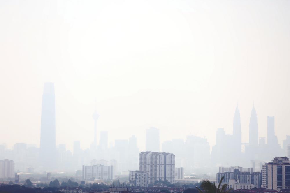 General view of the Kuala Lumpur skyline shrouded by haze on April 16, 2019. — Sunpix by Amirul Syafiq Mohd Din