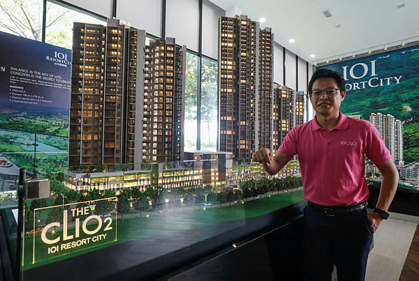 Tie sharing details of The Clio 2 Residences at the media preview.