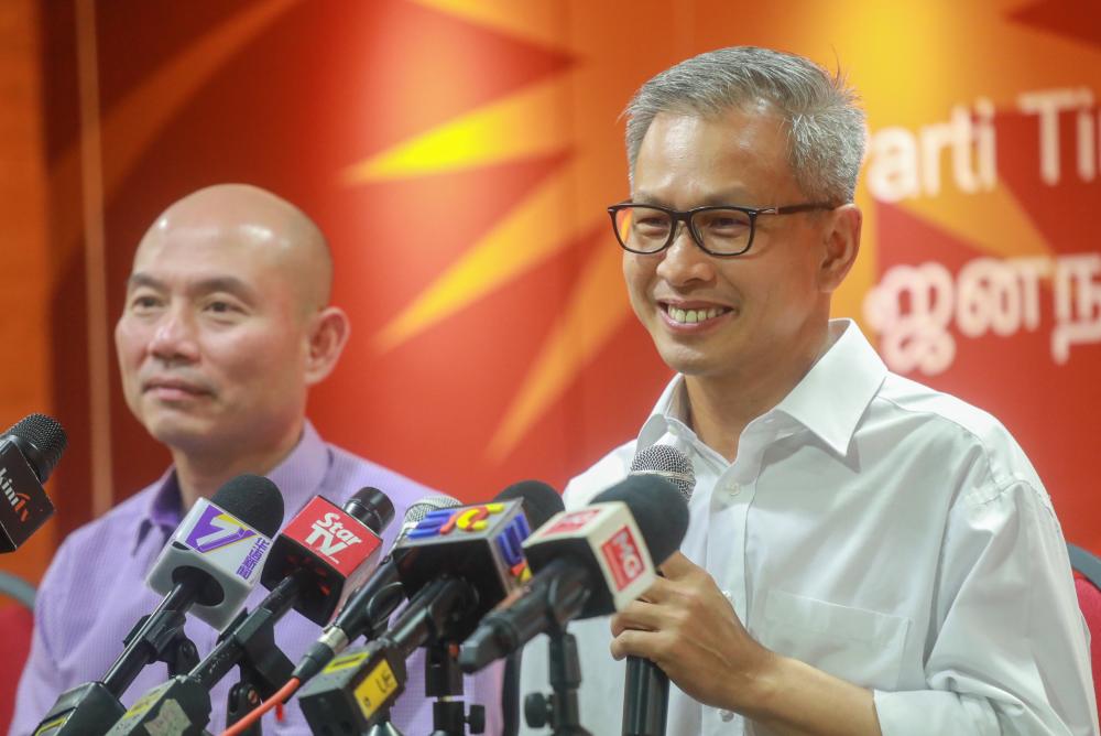 Tony Pua (R) speaks during a press conference on the attacks by MCA President, Datuk Seri Dr Wee Ka Siong against Lim Guan Eng, on Feb 11, 2019. — Sunpix by Amirul Syafiq Mohd Din