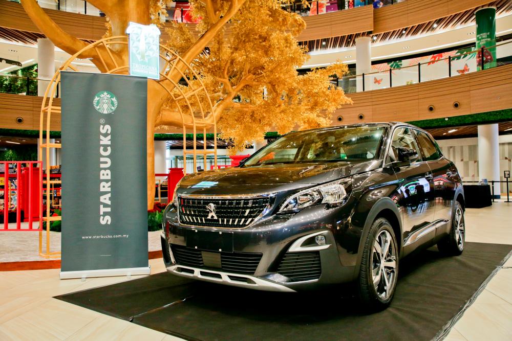 The Grand Prize of the Starbucks Sip and Win contest, the all-new Peugeot 3008 SUV Plus. $!The Grand Prize of the Starbucks Sip and Win contest, the all-new Peugeot 3008 SUV Plus.