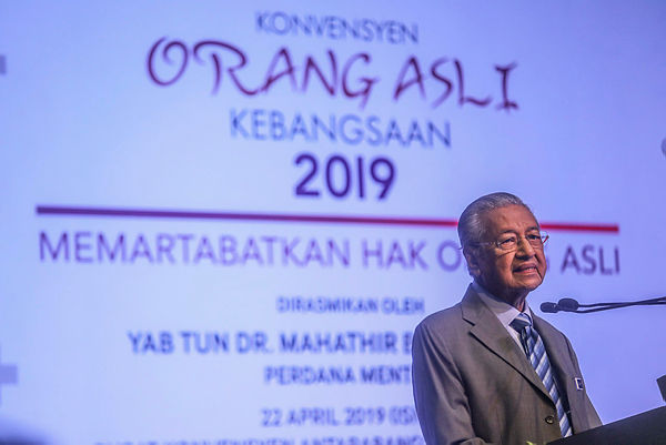 Prime Minister Tun Dr Mahathir Mohamad gives a speech at the opening of the National Orang Asli Convention 2019 at the Putrajaya International Convention Centre on the April 22, 2019. — Sunpix by Amirul Syafiq Mohd Din