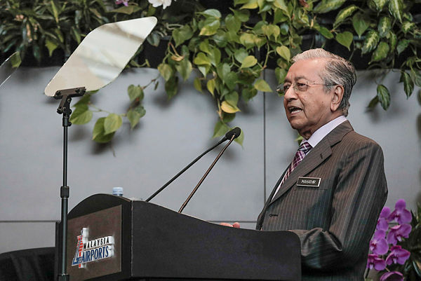 Filepix taken on Aug 13 shows Prime Minister Tun Mahathir Mohamad speaking during the launch of KLIA Turns 21 ceremony at Kuala Lumpur International Airport (KLIA). — Sunpix by Ashraf Shamsul