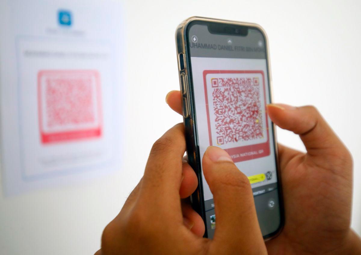 Pengunaan imbasan QR code - THESUNFOTO