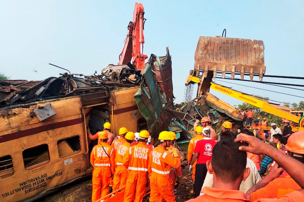 Members of the National Disaster Response Force (NDRF) conduct rescue operation at the site of train crash in Vizianagaram district of India’s Andhra Pradesh state on October 30, 2023/AFPPix