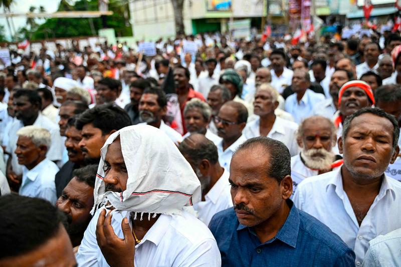 Members of All India Anna Dravida Munnetra Kazhagam (AIADMK) party protest against toxic alcohol that led to the death of residents at Kallakurichi in India's Tamil Nadu state - AFPpix