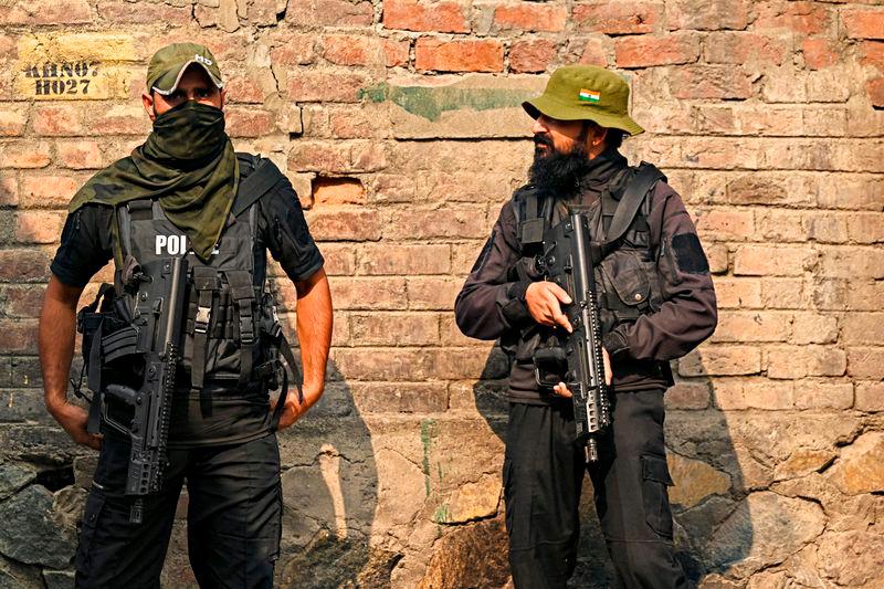 Indian security personnel stand guard near the site of a gunbattle between suspected militants and Indian forces in Srinagar - AFPpix