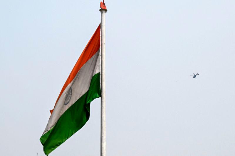 The Indian national flag flutters as a military helicopter flies over the skies of Srinagar on May 2, 2025. AFPpix