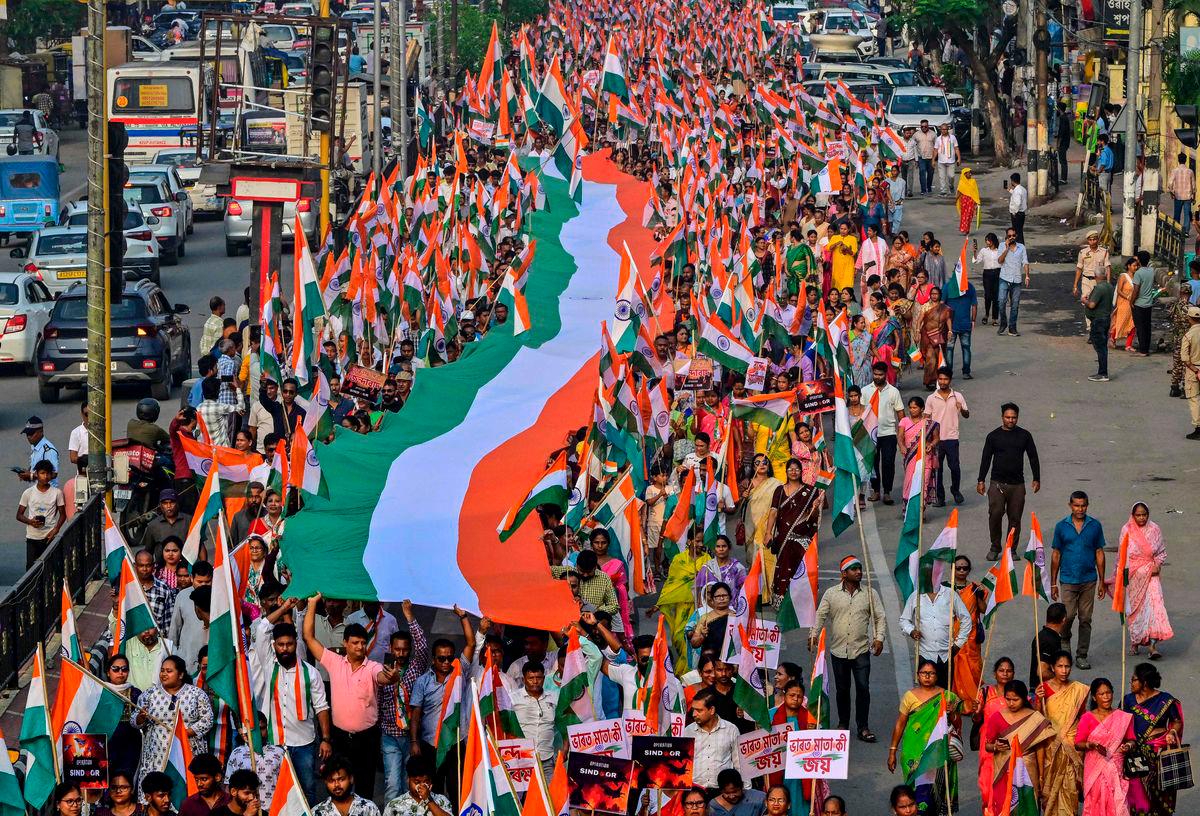 People holding Indian national flags take part in a rally, expressing solidarity with the armed forces in Guwahati on May 14, 2025. AFPpix